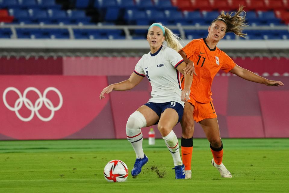 Team United States midfielder Julie Ertz (8) dribbles the ball in front of Team Netherlands forward Lieke Martens (11) during the first half.