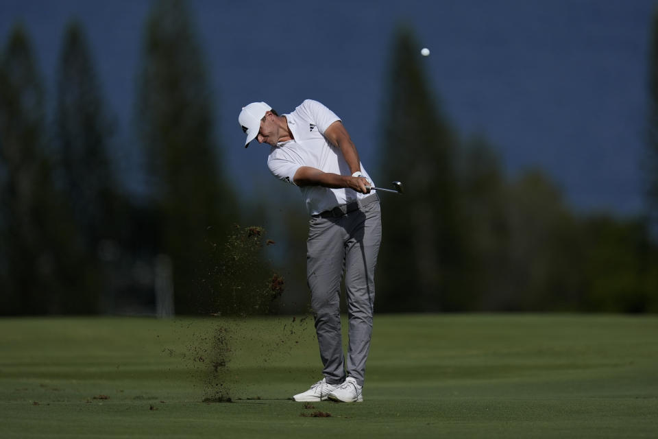 Ludvig Aberg hits form the fourth fairway during the first round of The Sentry golf event, Thursday, Jan. 4, 2024, at Kapalua Plantation Course in Kapalua, Hawaii. (AP Photo/Matt York)