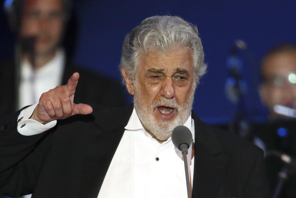 FILE- In this Aug. 28, 2019, file photo, opera singer Placido Domingo performs during a concert in Szeged, Hungary. Domingo will make his first public appearance since recovering from coronavirus to accept a lifetime achievement award on Aug. 6 in Salzburg, Austria. (AP Photo/Laszlo Balogh, File)