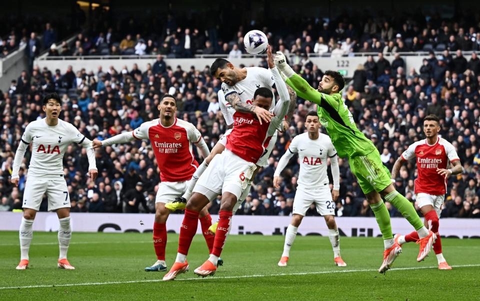 Cristian Romero heads towards goal