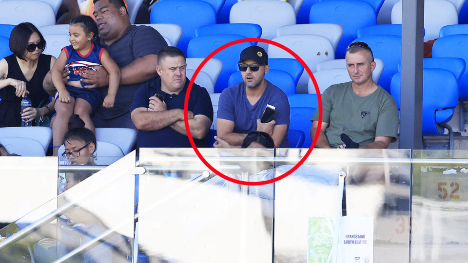 Isaac Moses, pictured here in the stands during the NRL trial match between North Sydney and the Canberra Raiders. 