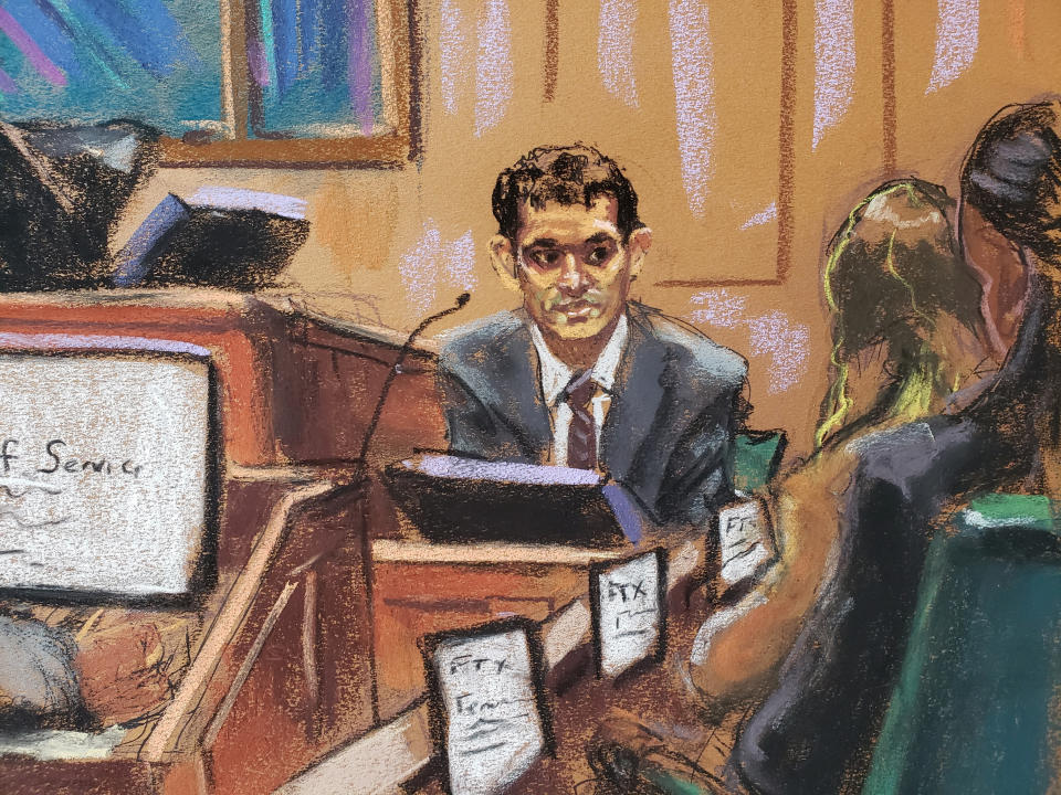 FTX founder Sam Bankman-Fried is questioned by lawyer Mark Cohen (not pictured) as he testifies in his fraud trial over the collapse of the bankrupt cryptocurrency exchange, at federal court in New York City, U.S., October 27, 2023 in this courtroom sketch. REUTERS/Jane Rosenberg