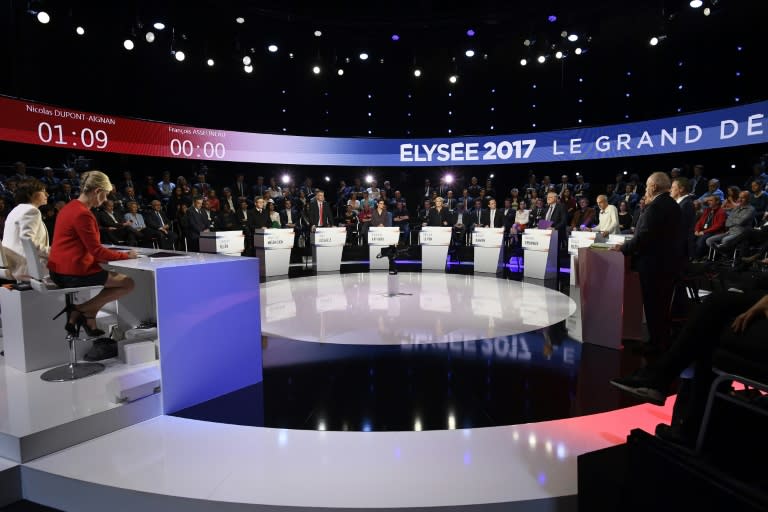 The eleven candidates for the French presidential election attend a debate organised by the private TV channels BFM TV and CNews, on April 4, 2017 in La Plaine-Saint-Denis