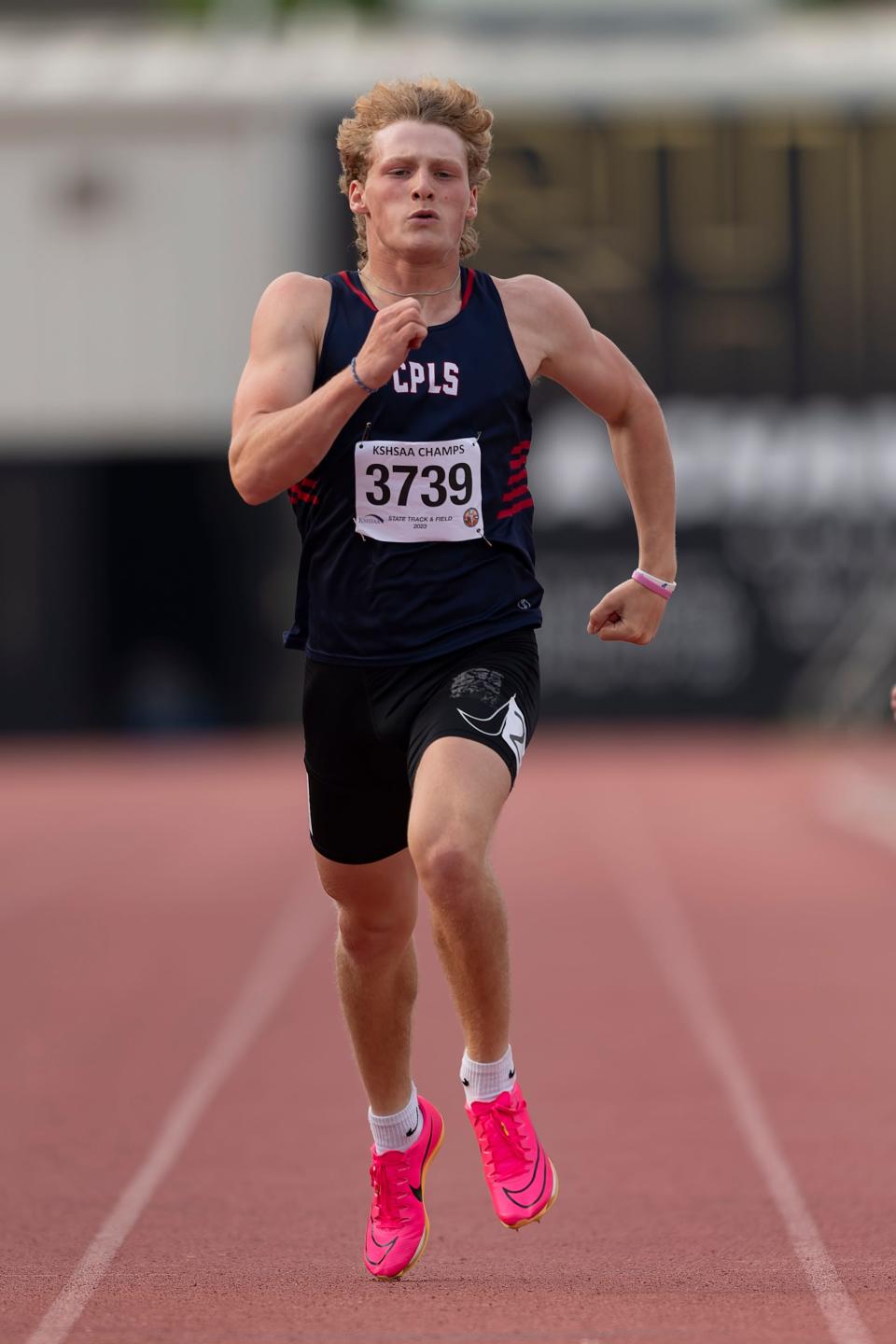 Cair Paravel Ben Roeder competes in the 200 meter dash on Saturday May. 27, 2023, during the state track meet at Cessna Stadium in Wichita, Kan.