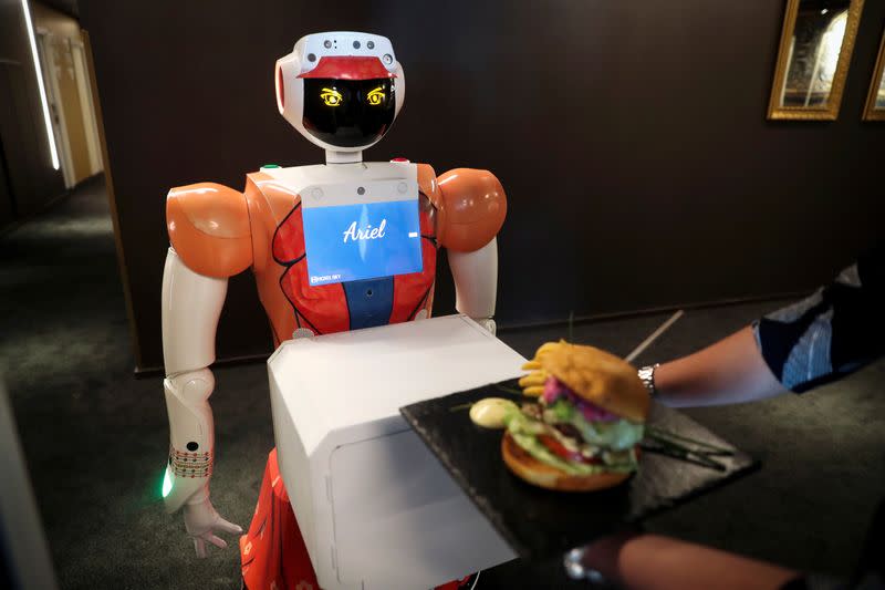 AI-powered robots work at the Hotel Sky in Johannesburg