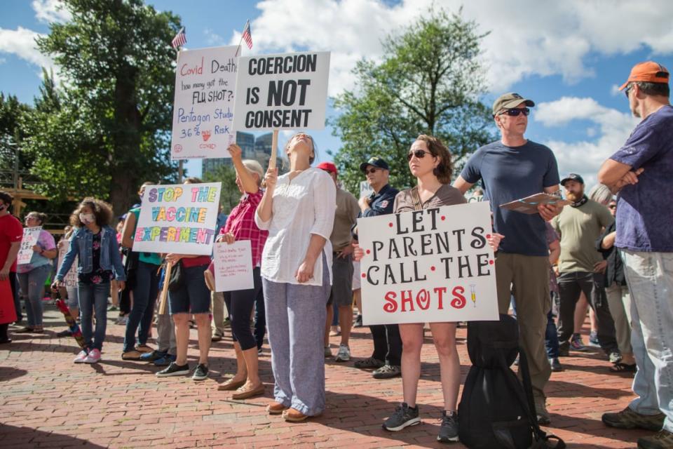 <div class="inline-image__caption"><p>Anti-vaccine activists protest against Governor Charlie Baker's mandate that all Massachusetts school students must receive the flu vaccine, on Aug. 30, 2020, in Boston, Massachusetts. </p></div> <div class="inline-image__credit">Scott Eisen/Getty Images</div>