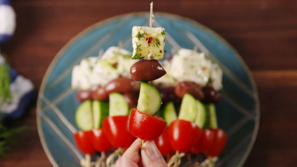 <p>Like a Greek salad on a stick!</p><p>Get the recipe from <a href="https://www.delish.com/cooking/recipe-ideas/recipes/a52183/greek-salad-skewers-recipe/" rel="nofollow noopener" target="_blank" data-ylk="slk:Delish;elm:context_link;itc:0;sec:content-canvas" class="link ">Delish</a>.</p>