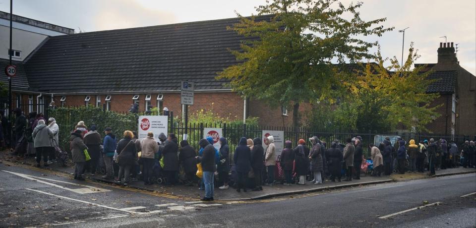 Queues outside a food bank in north London (Matt Writtle)