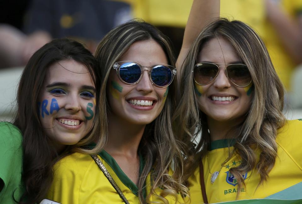 Fans of Brazil wait for the start of their 2014 World Cup quarter-finals against Colombia at the Castelao arena in Fortaleza July 4, 2014. REUTERS/Jorge Silva