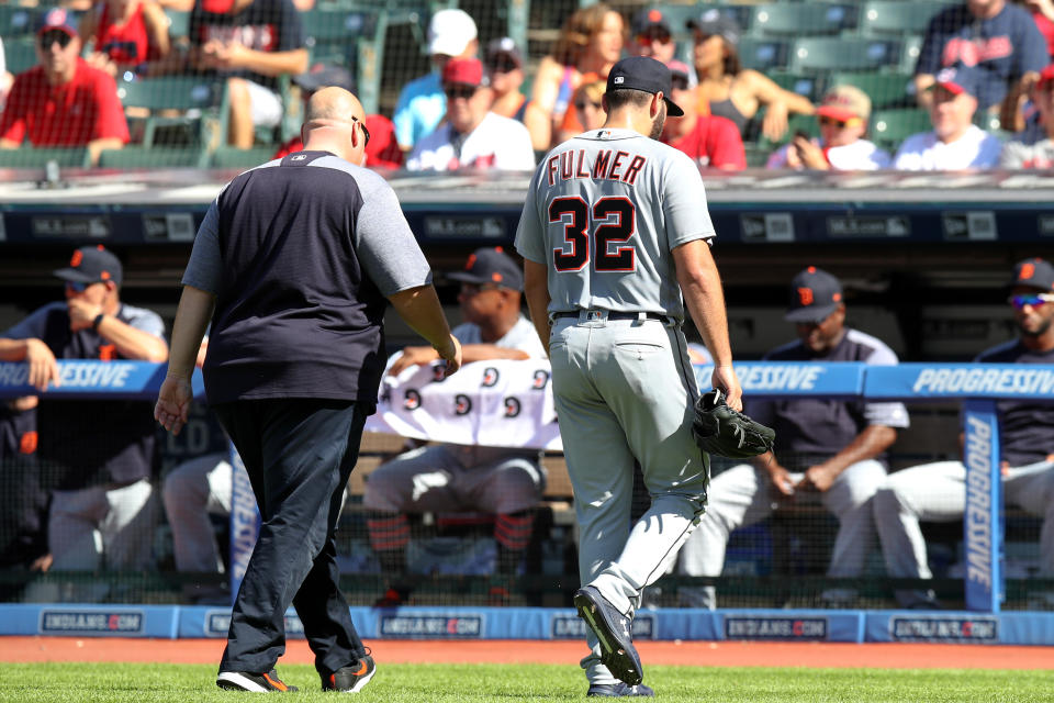 CLEVELAND, OH - SEPTEMBER 15: Detroit Tigers starting pitcher Michael Fulmer (32) leaves the field with a trainer as he was forced to leave the game after giving up back to back home runs to start the Cleveland half of the first inning of the Major League Baseball game between the Detroit Tigers and Cleveland Indians on September 15, 2018, at Progressive Field in Cleveland, OH. (Photo by Frank Jansky/Icon Sportswire via Getty Images)