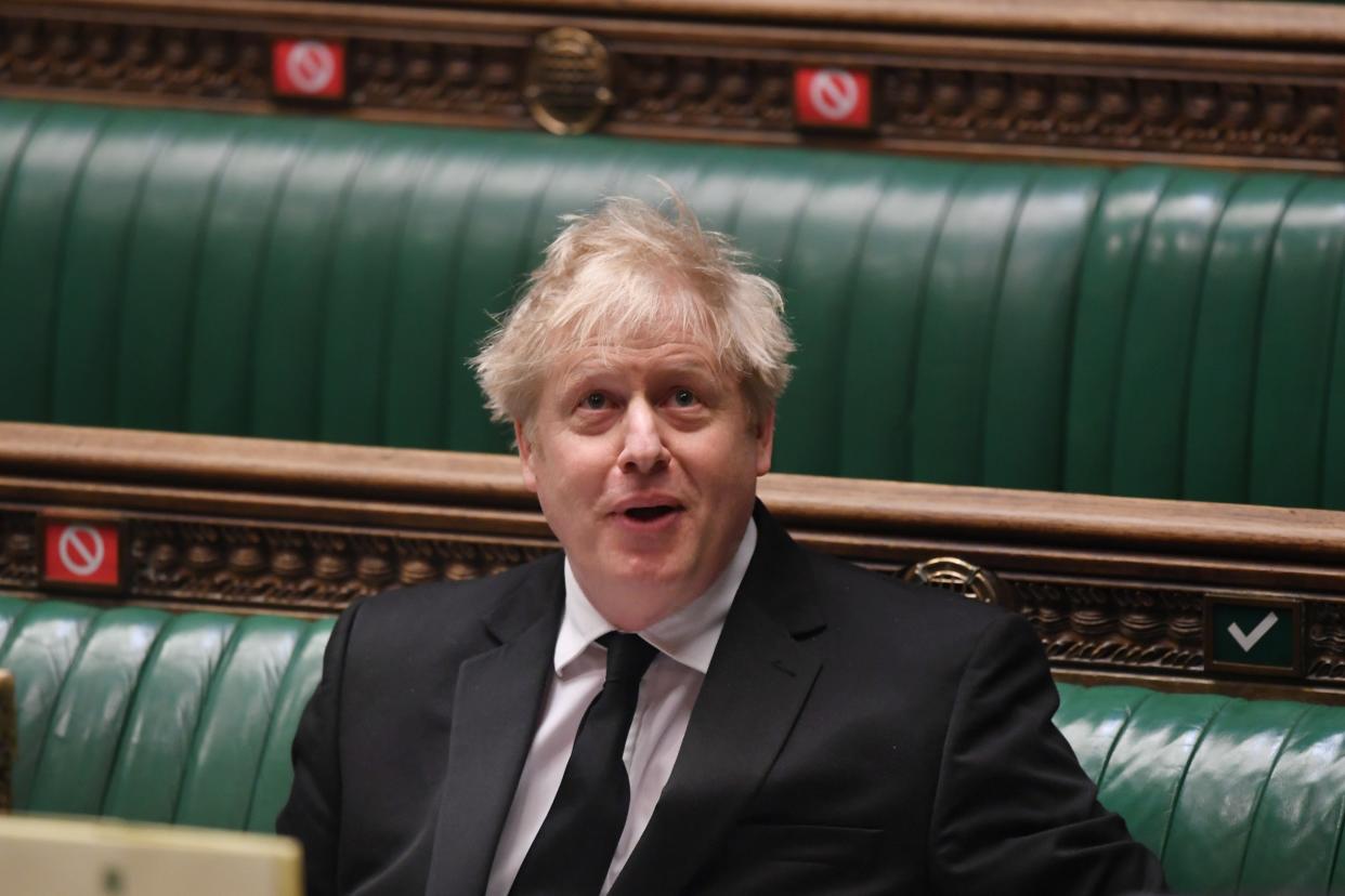 Boris Johnson pictured in the House of Commons on Wednesday during PMQs (via REUTERS)