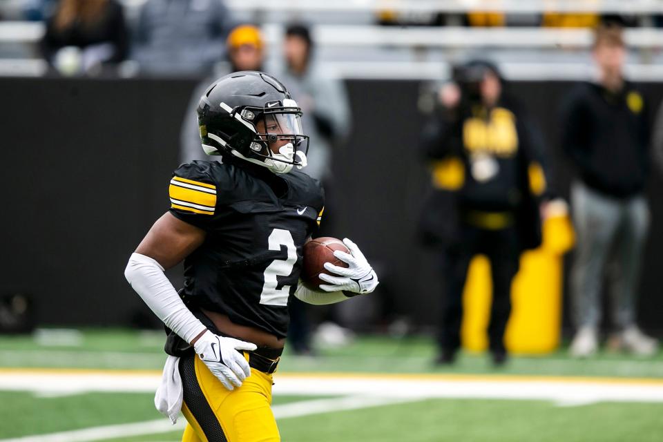 Iowa running back Kaleb Johnson (2) runs a drill during the Hawkeyes' final spring NCAA football practice, Saturday, April 22, 2023, at Kinnick Stadium in Iowa City, Iowa.