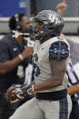 Central Florida wide receiver Marlon Williams celebrates his 54-yard touchdown on a pass play against Tulane during the first half of an NCAA college football game, Saturday, Oct. 24, 2020, in Orlando, Fla. (AP Photo/John Raoux)