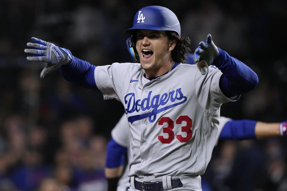 Los Angeles Dodgers' James Outman celebrates his grand slam against the Chicago Cubs during the ninth inning of a baseball game in Chicago, Thursday, April 20, 2023. (AP Photo/Nam Y. Huh)