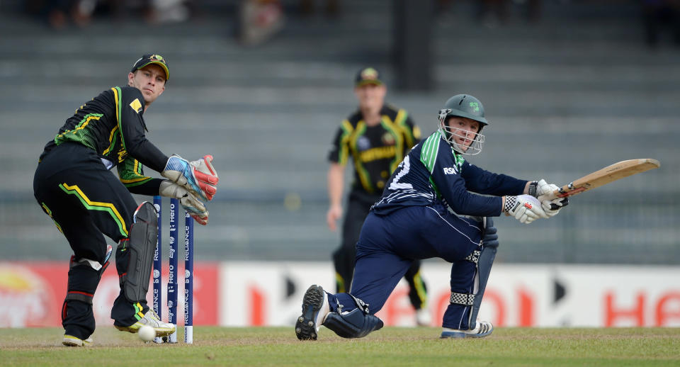 COLOMBO, SRI LANKA - SEPTEMBER 19: Niall O'Brien of Ireland hits past Australia wicketkeeper Matthew Wade during ICC World Twenty20 2012: Group B match between Australia and Ireland at R. Premadasa Stadium on September 19, 2012 in Colombo, Sri Lanka. (Photo by Gareth Copley/Getty Images)