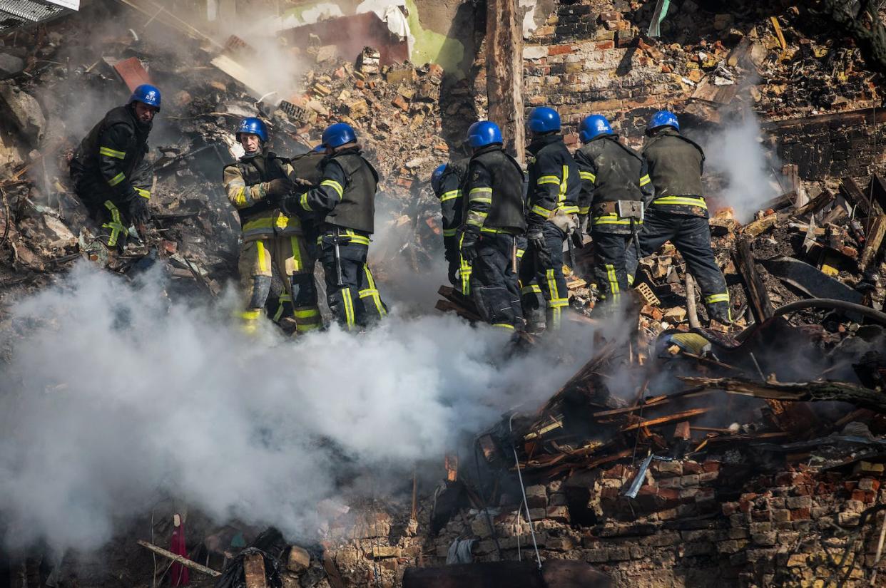 Ukrainian rescuers work at the site of a Kyiv residential building destroyed by a drone that local authorities consider to be Iranian-made. <a href="https://www.gettyimages.com/detail/news-photo/ukrainian-rescuers-work-at-the-site-of-a-residential-news-photo/1244045819?phrase=iranian%20drones&adppopup=true" rel="nofollow noopener" target="_blank" data-ylk="slk:Oleksii Chumachenko/SOPA Images/LightRocket via Getty Images;elm:context_link;itc:0;sec:content-canvas" class="link ">Oleksii Chumachenko/SOPA Images/LightRocket via Getty Images</a>