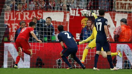 Britain Football Soccer - Bayern Munich v Atletico Madrid - UEFA Champions League Semi Final Second Leg - Allianz Arena, Munich - 3/5/16 Robert Lewandowski scores the second goal for Bayern Munich Reuters / Michaela Rehle Livepic