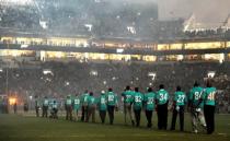 Dec 14, 2015; Miami Gardens, FL, USA; Members of the Miami Dolphins all-time team walk onto the field for a celebration of the team's fifty year history during halftime of the game against the New York Giants at Sun Life Stadium. Mandatory Credit: Robert Duyos-USA TODAY Sports