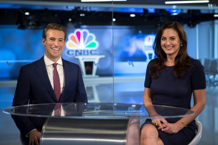 Anchors Hadley Gamble and Dan Murphy at the opening of CNBC's new studios at Nasdaq Market Site Dubai