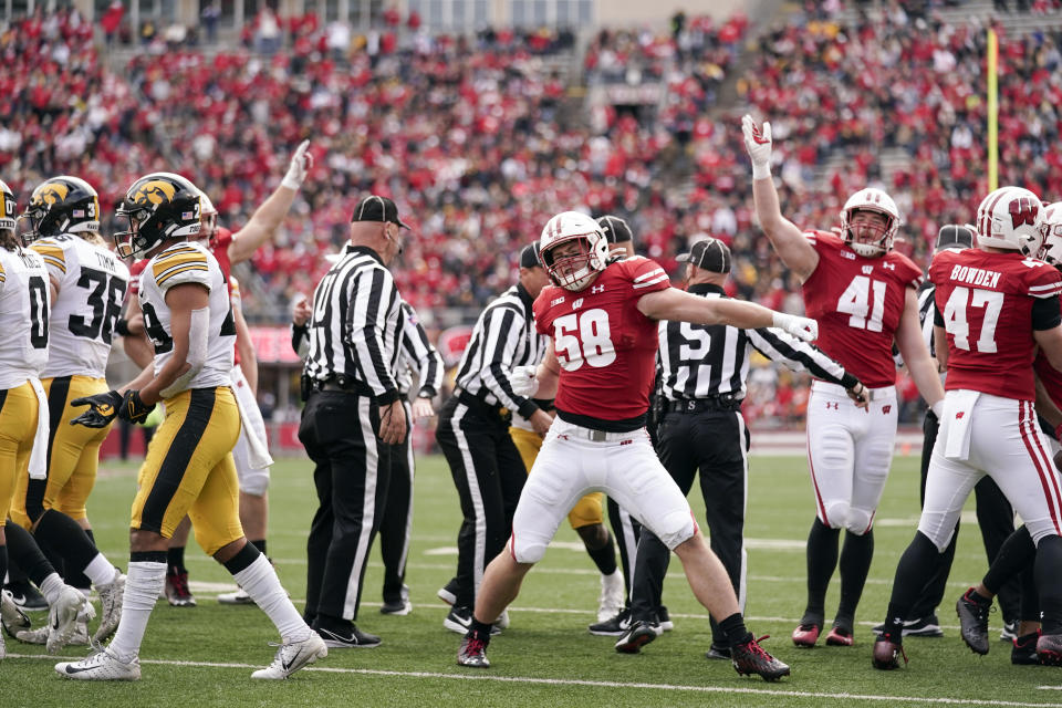 Wisconsin linebacker Mike Maskalunas (58) celebrates after Wisconsin recovered an Iowa fumble during the first half of an NCAA college football game Saturday, Oct. 30, 2021, in Madison, Wis. (AP Photo/Andy Manis)