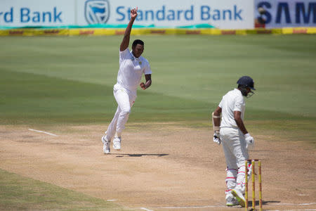 Cricket - India v South Africa - Second Test match - Centurion Stadium, Pretoria, South Africa - January 17, 2018. South Africa's Lungi Ngidi celebrates taking the wicket of India’s Ravichandran Ashwin. REUTERS/James Oatway