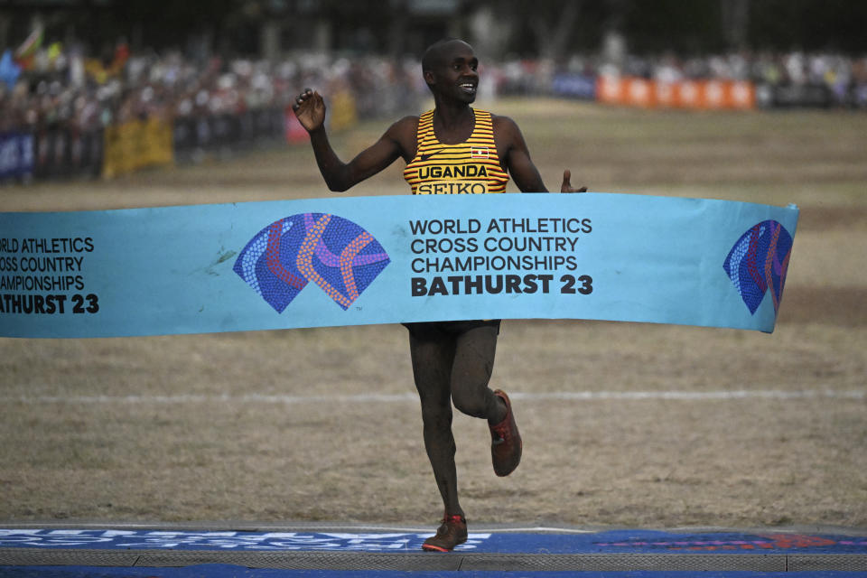 Jacob Kiplimo of Uganda crosses the finish line to win the senior men's race at the World Athletics Cross Country Championships in Bathurst, Australia, Saturday, Feb. 18, 2023. (Dean Lewins/AAP Image via AP)