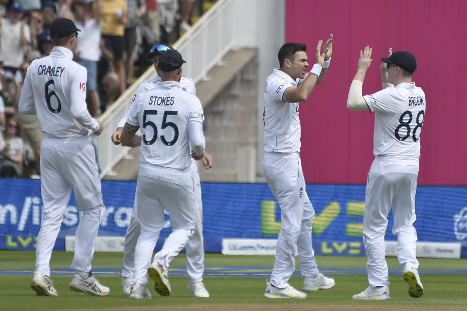 England's James Anderson, second left celebrates with teammates after taking the wicket of Australia's Alex Carey clean bowled during day three of the first Ashes Test cricket match between England and Australia at Edgbaston, Birmingham, England, Sunday, June 18, 2023. (AP Photo/Rui Vieira)