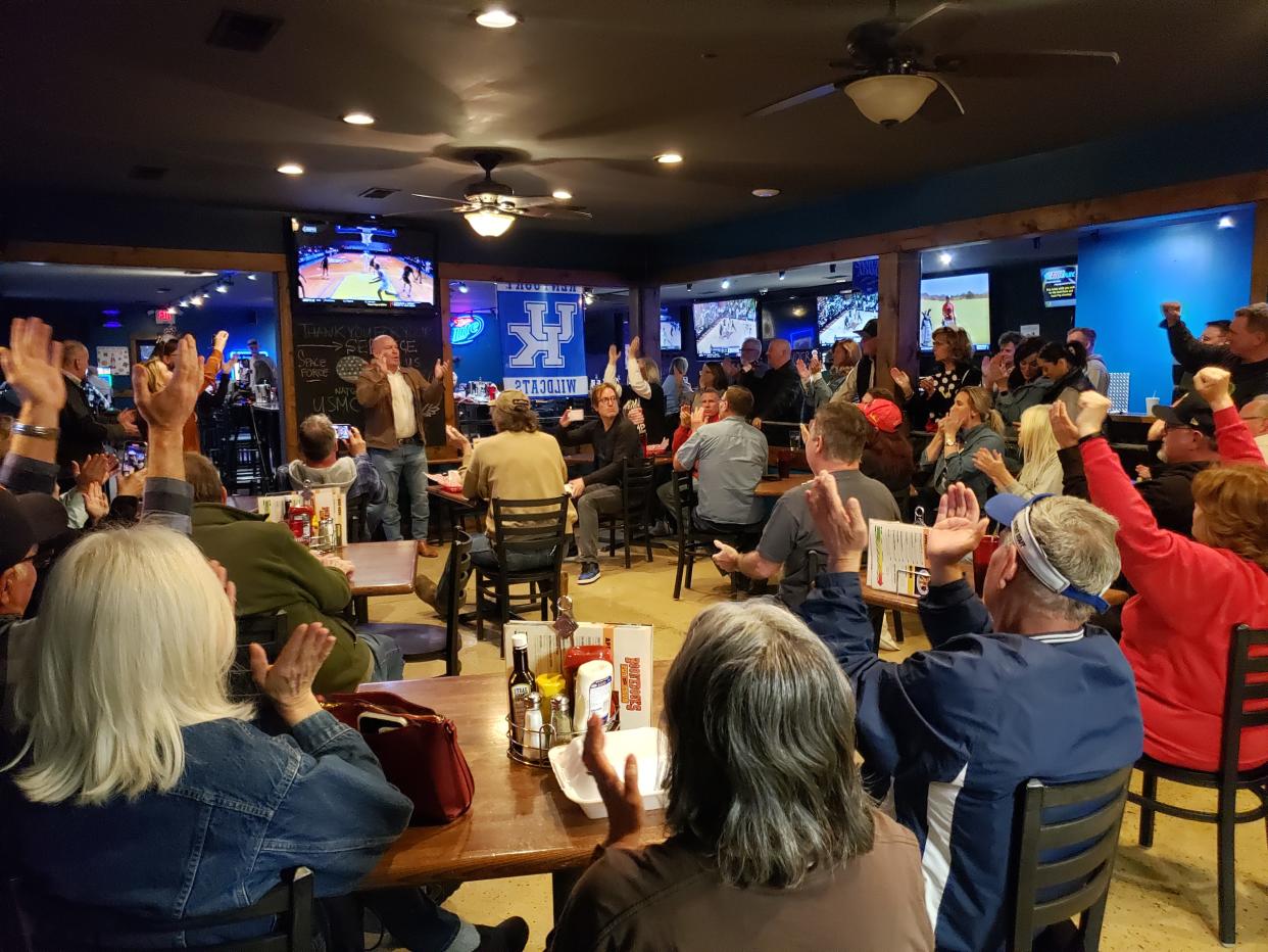About 40 people attended a rally in support of former President Donald Trump Tuesday night at Boonedocks Pub and Grub in Union, Kentucky.