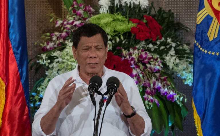 Rodrigo Duterte ends his first year as Philippine president hugely popular, taking Filipinos on a promised "rough ride" of drug war killings and foreign policy U-turns