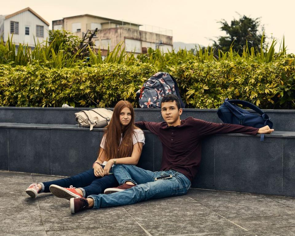 Nahielys Gonzales and Yamil Rodríguez after school in the town square of Utuado.