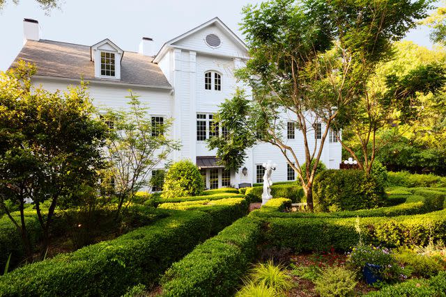 Cedric Angeles Fairview Inn features a formal garden out back.