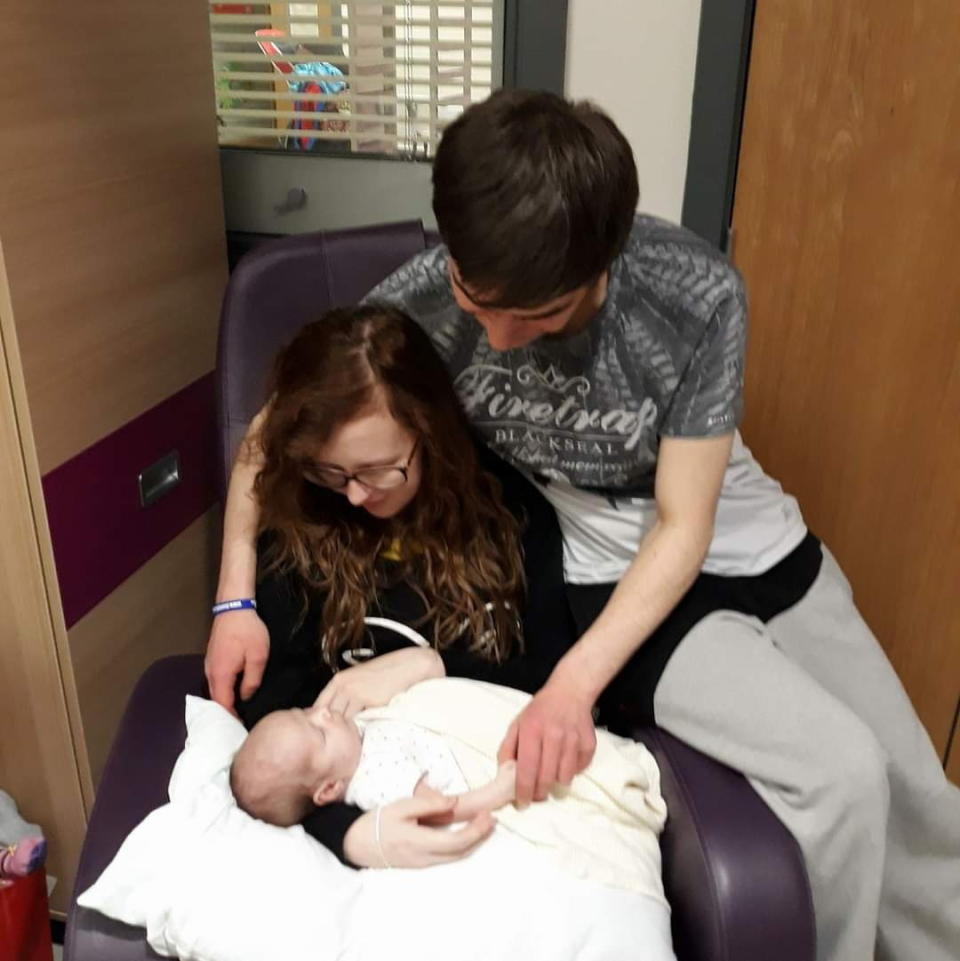 Kerri and Igor in hospital with baby Amelia after learning of her leukaemia diagnosis. (Kerri Paton/SWNS)