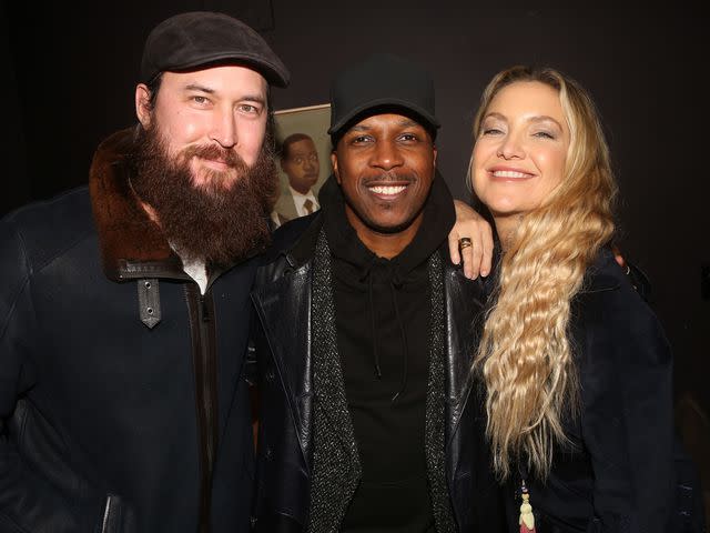 <p>Bruce Glikas/WireImage</p> Danny Fujikawa, Leslie Odom Jr and Kate Hudson pose backstage at "Purlie Victorious" on Broadway on November 11, 2023.