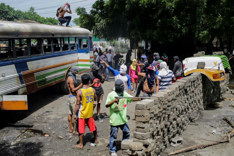 Anti-government demonstrators set up a barricade in Tipitapa, about 25 kilometers (15 miles) from Nicaraguan capital Managua, during a day-long national strike