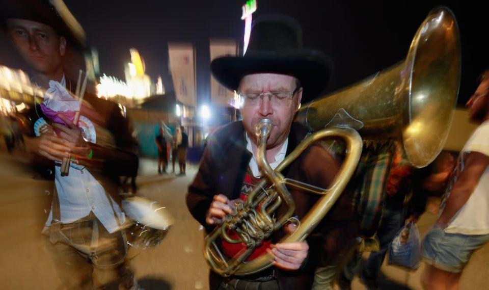 Austrian brass musicians perform a private serenade at the Oktoberfest in Munich, Germany.