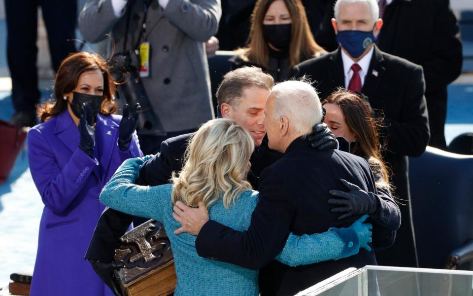 Biden hugs his family after becoming president - REUTERS