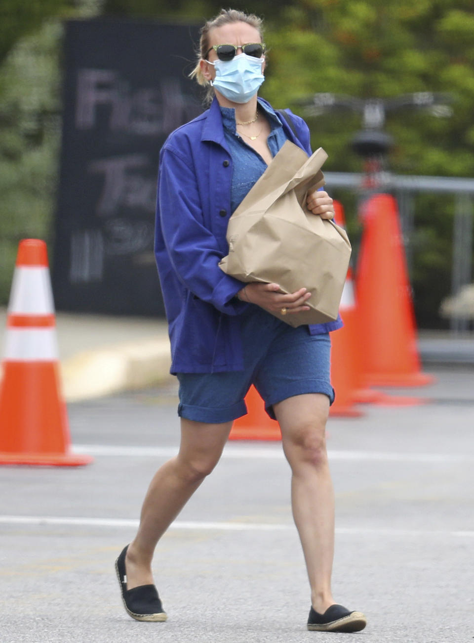 <p>Scarlett Johansson grabs groceries in a monochromatic blue ensemble on Thursday in East Hampton, New York. </p>