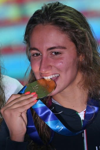 Italy's Simona Quadarella poses with her gold medal after the final of the women's 1500m freestyle event