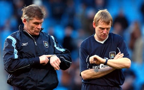 Manchester City's head coach Derek Fazackerley (l) and coach Stuart Pearce - Credit: Neal Simpson/EMPICS Sport