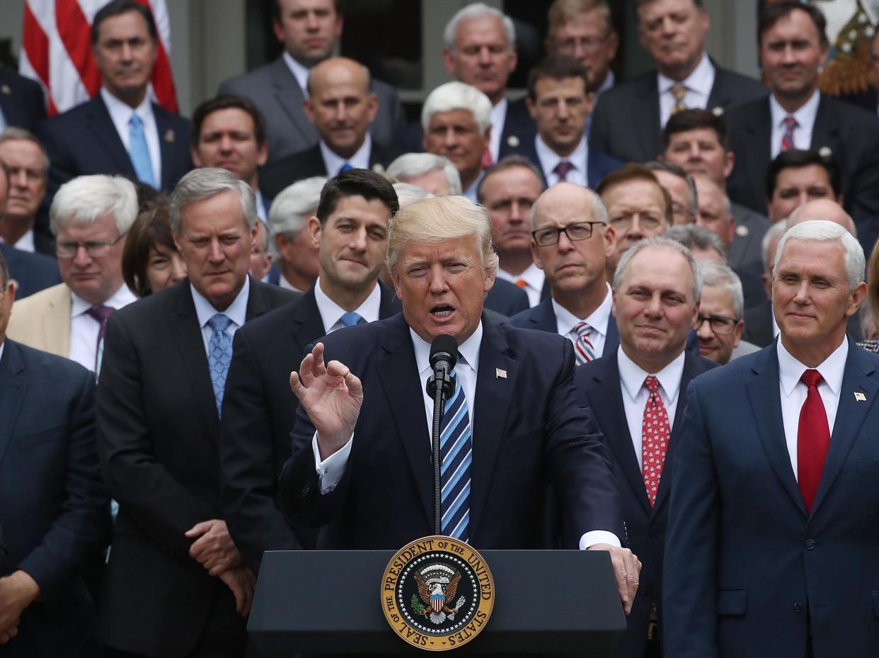 Donald Trump and House Republicans celebrate after passing legislation aimed at repealing and replacing ObamaCare: Mark Wilson/Getty Images