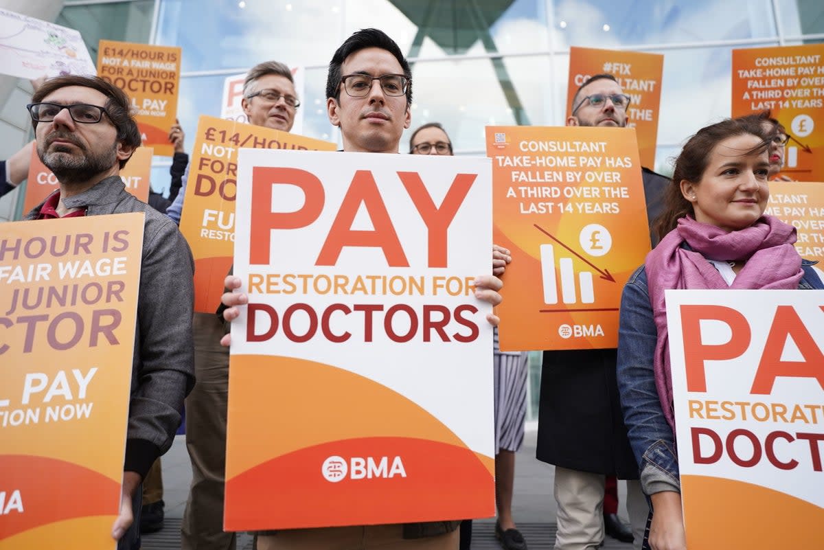 Junior doctors say it would have been cheaper for the government to address pay than deal with the strikes  (PA)