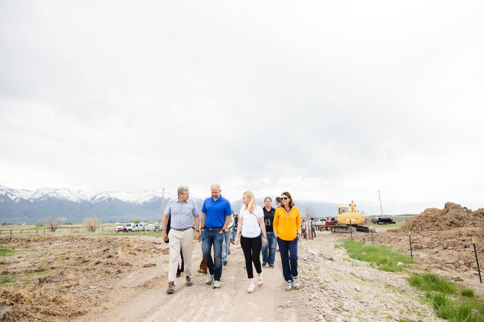 Dave Livermore, The Nature Conservancy director in Utah, left, leads a tour of the completion of the Freeport Drain project at the Great Salt Lake Shorelands Preserve in Layton on Wednesday, May 17, 2023. | Ryan Sun, Deseret News