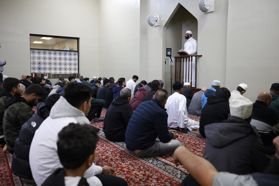 Imam Sohail Chaudhry delivers a sermon during Friday prayers, Friday, Oct. 13, 2023, at the Islamic Center of East Lansing in East Lansing, Mich. In Muslim communities across the world, worshippers gathered at mosques for their first Friday prayers since Hamas militants attacked Israel, igniting the ongoing Israel-Hamas war. (AP Photo/Al Goldis)