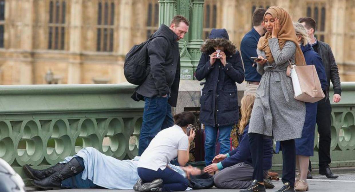 Man who posted image of Muslim woman ‘ignoring Westminster terror victims’ was a Russian troll