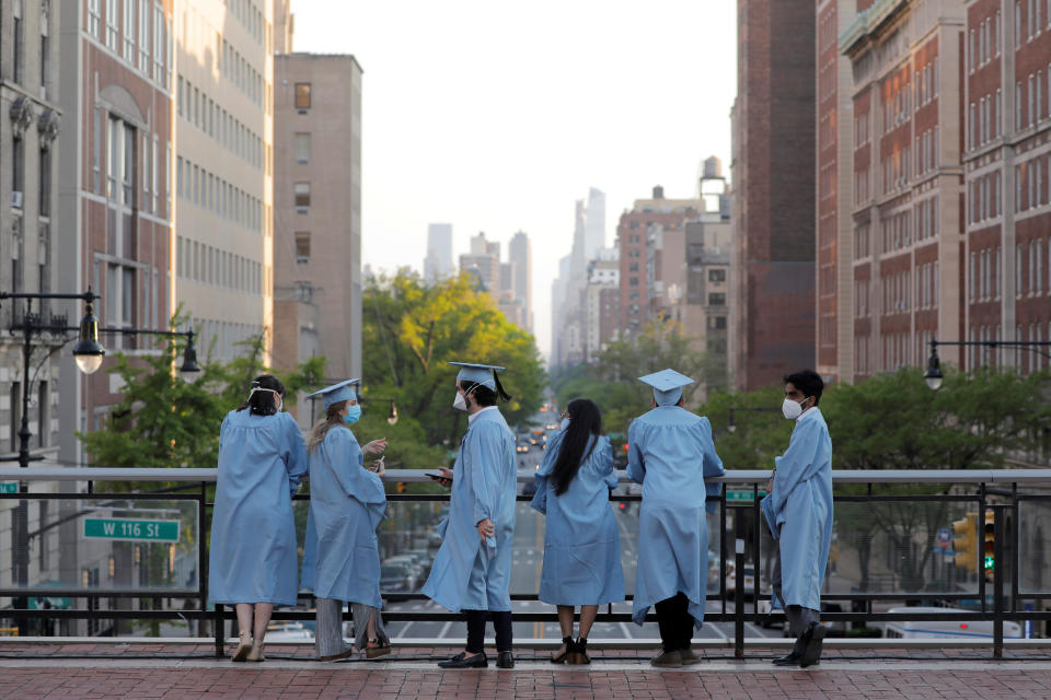 Graduating Masters Students from the Columbia University Graduate School of Architecture, Planning and Preservation (GSAPP) gather together the day before their graduation ceremony, which is to be held online due to the outbreak of the coronavirus disease (COVID-19) in Manhattan, New York City, U.S., May 15, 2020. REUTERS/Andrew Kelly