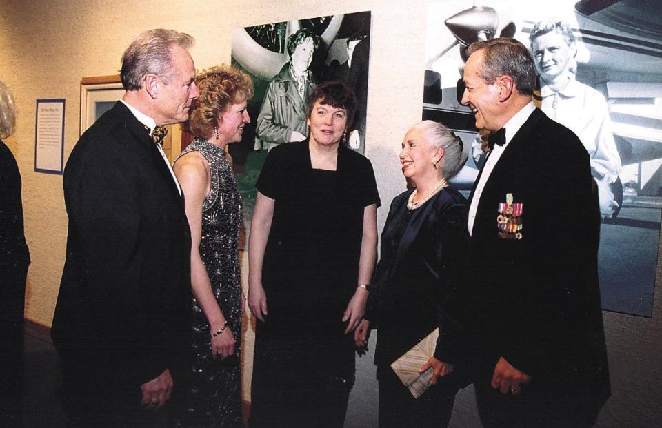 In this 2001 file photo, John Lawrence, inductee Christine Lawrence, Donna Shirley, Nina Holmes and inductee retired Maj. Gen. Jerry Holmes reminisce.