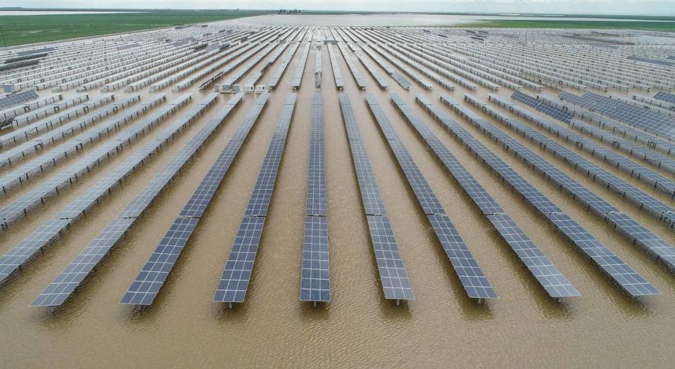 Panels from a solar farm sit in floodwater in Kings County south of Hanford on Thursday, March 23, 2023.