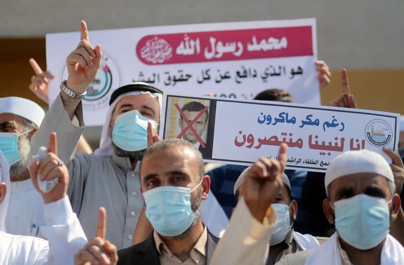 Palestinians gather to protest against the publications of a cartoon of Prophet Mohammad