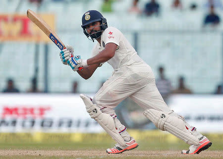 Cricket - India v New Zealand - Second Test cricket match - Eden Gardens, Kolkata, India - 02/10/2016. India's Rohit Sharma plays a shot. REUTERS/Rupak De Chowdhuri