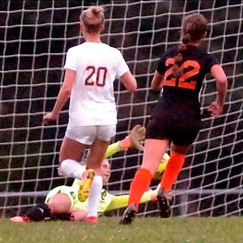 Lexington's Makenna Arnholt scores a goal during soccer action between Lexington and Ashland.